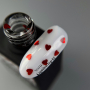 NAILSOFTHEDAY Kupidon top 02 — ніжне фінішне покриття для нігтів з елегантно бордовими сердечками, без липкого шару, 10 мл